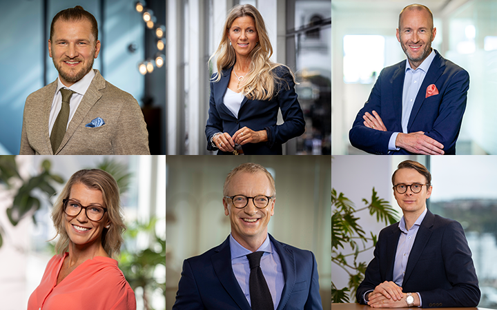 Affärspersoner i professionella kläder i kontorsmiljö